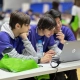 Estudiantes del institutos concertados Madrid participando en un torneo de programación en equipo.